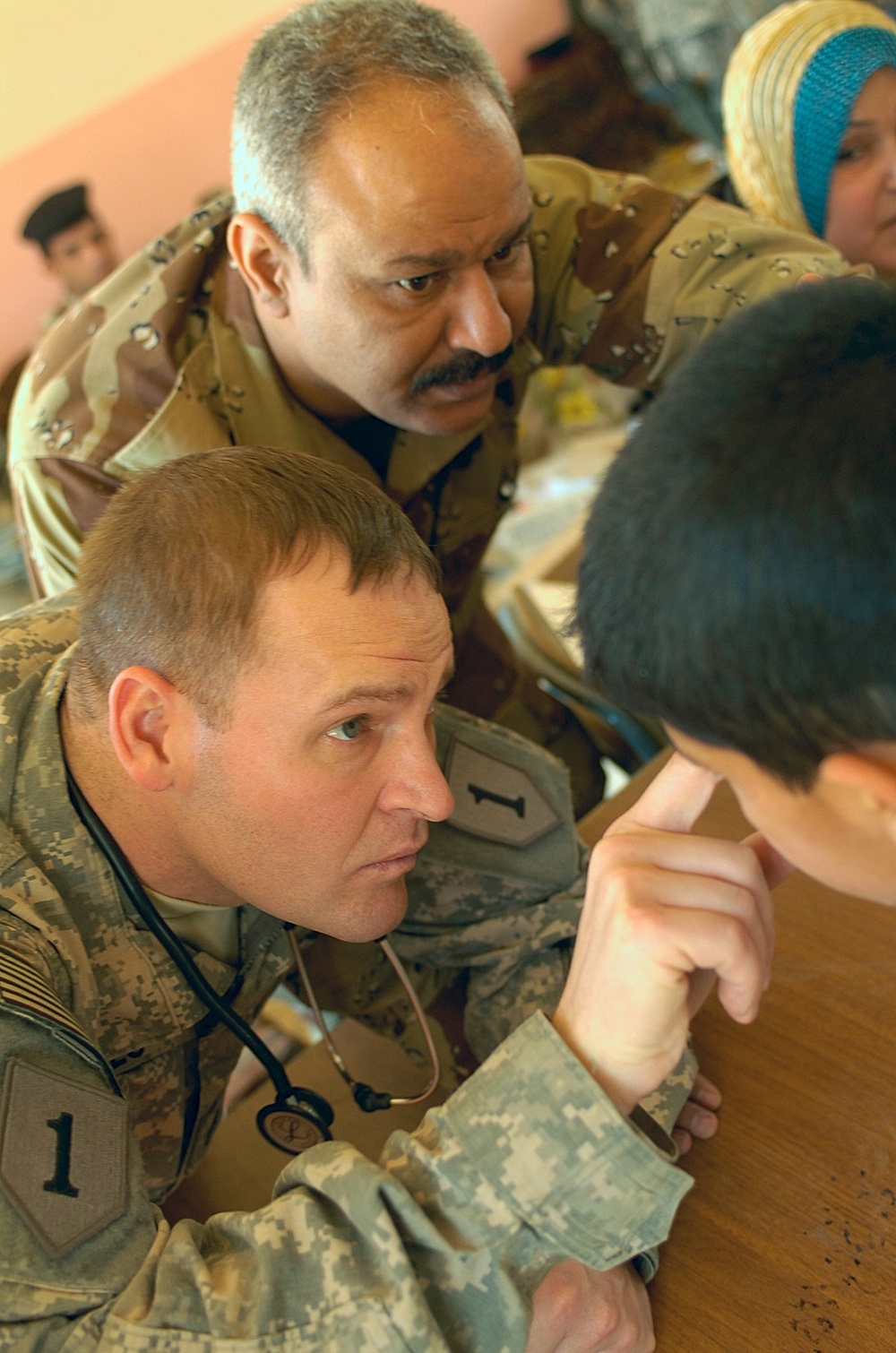 Iraqi Army, Military Transition Team Members Bring Hope to Al-Shaab