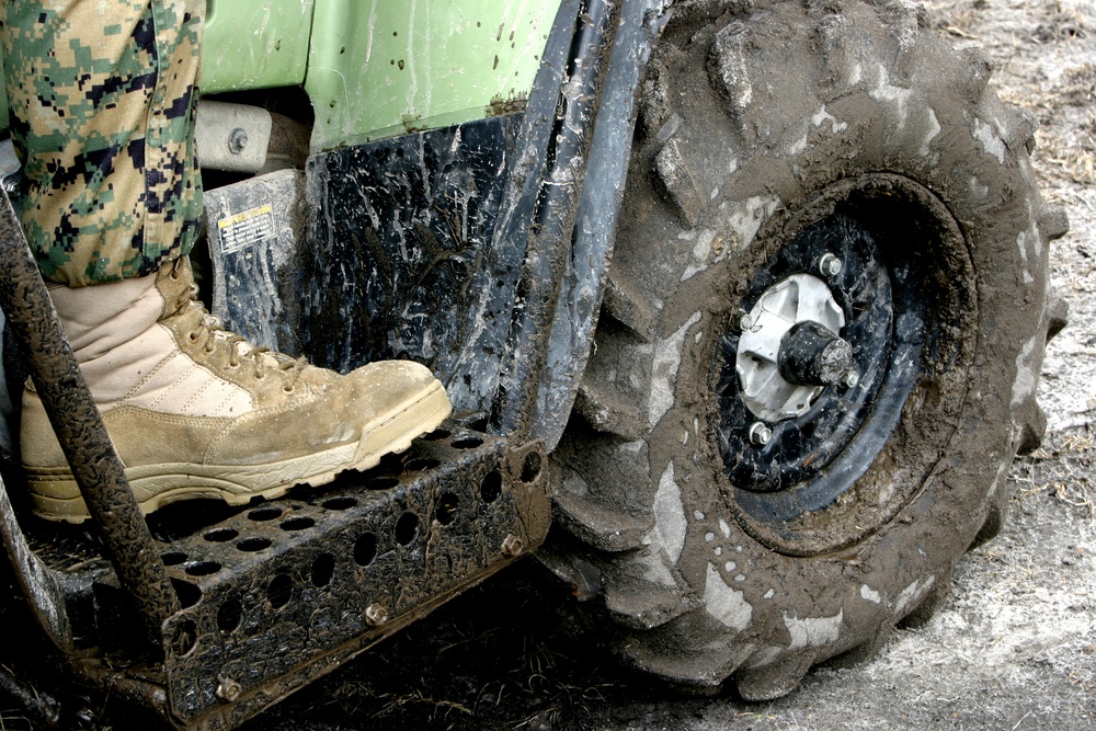 Riding dirty Marine Special Operations Command train on all-terrain vehicles