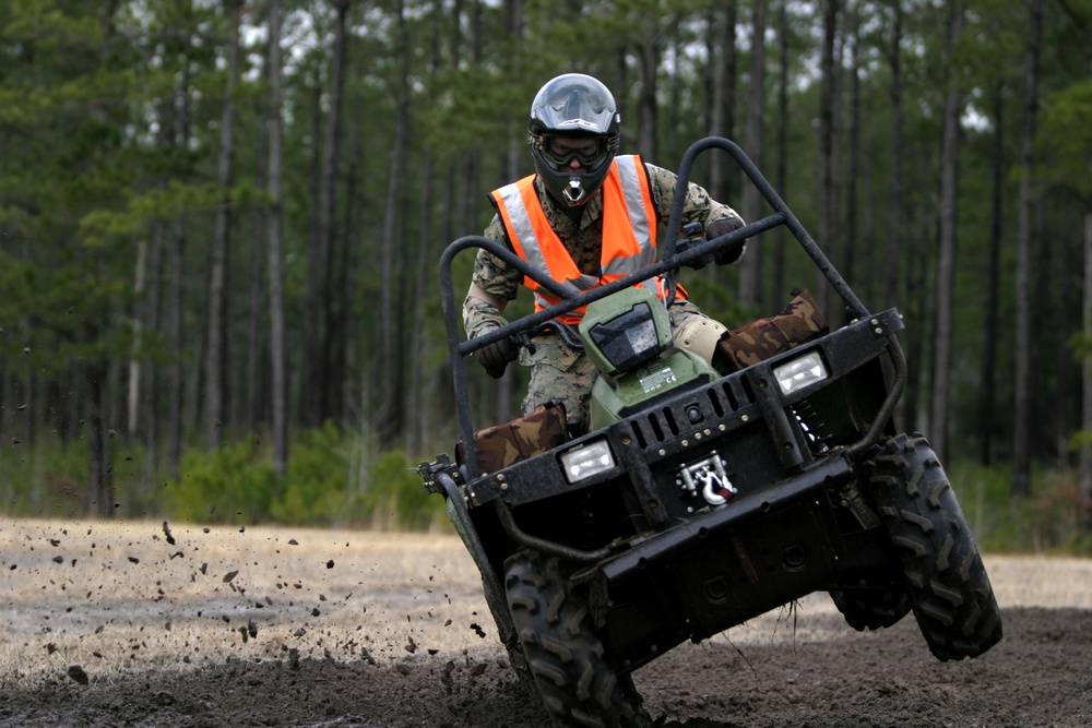 Riding dirty Marine Special Operations Command train on all-terrain vehicles