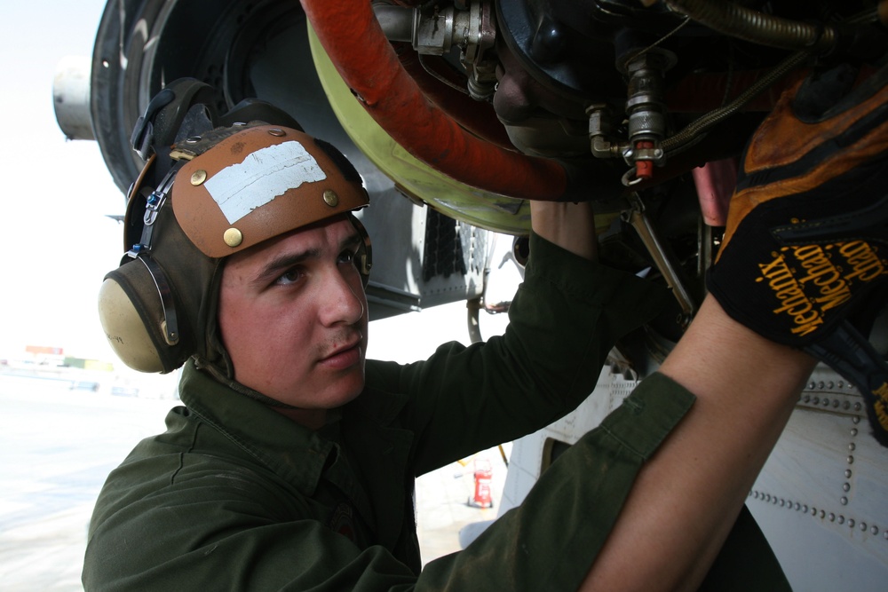 Marine Helo Mechanics Repair Damaged Hornet in Afghanistan