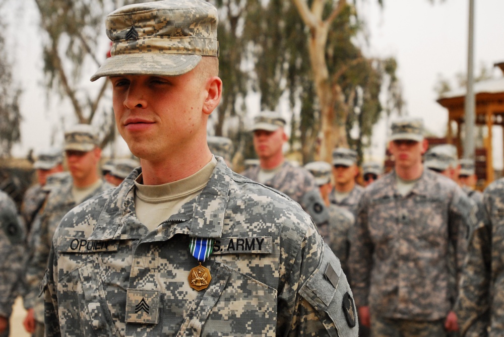 Sgt. Greg D. Opoien Receives Army Achievement Medal in Iraq