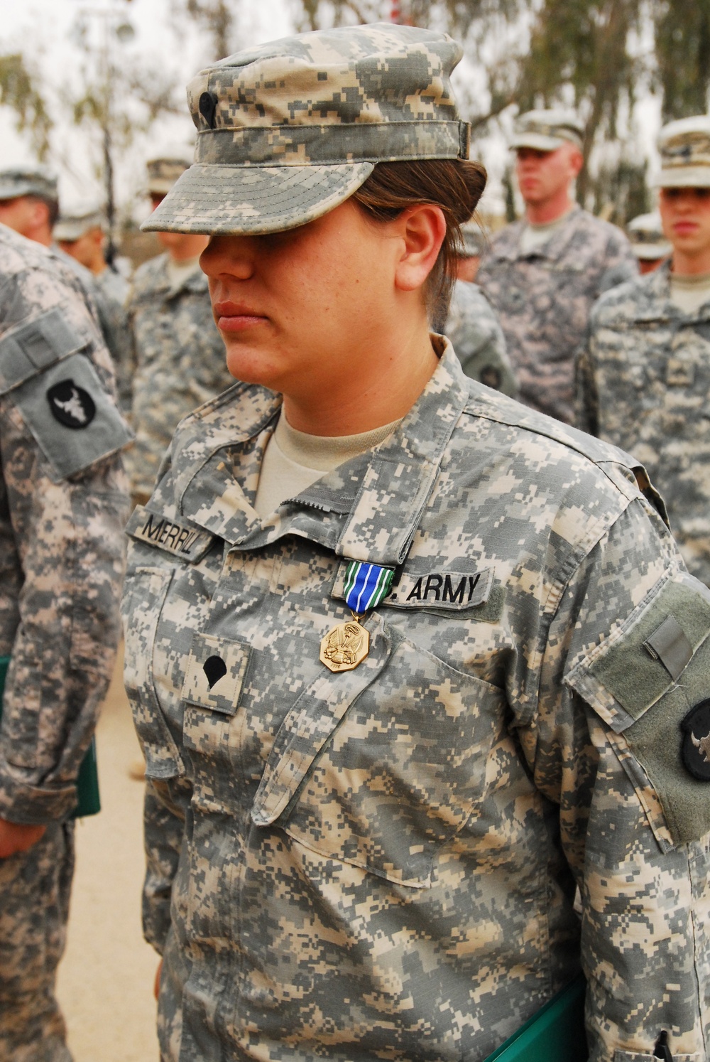 Sgt. Greg D. Opoien Receives Army Achievement Medal in Iraq