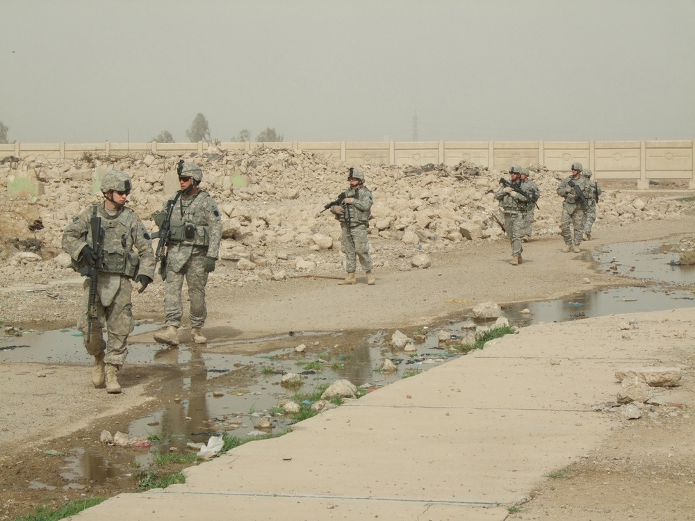 Troop C searches for weapons in Taji