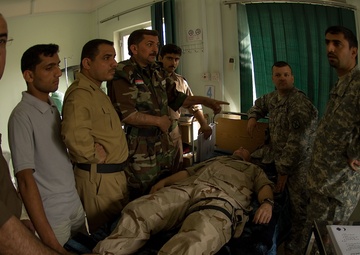 Iraqi Department of Border Enforcement agents learn basic first aid