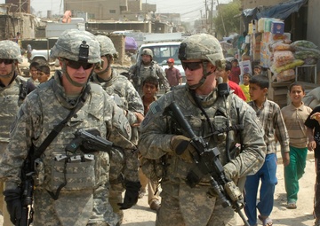 Paratroopers, embedded provincial reconstruction team assess market projects in poverty stricken area of 9 Nissan