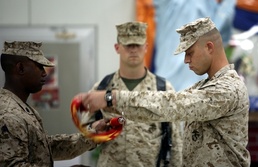 Marine Wing Support Squadron 373 passes on gained ground to 1st Battalion, 8th Marines