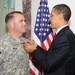 Obama visits Camp Victory troops