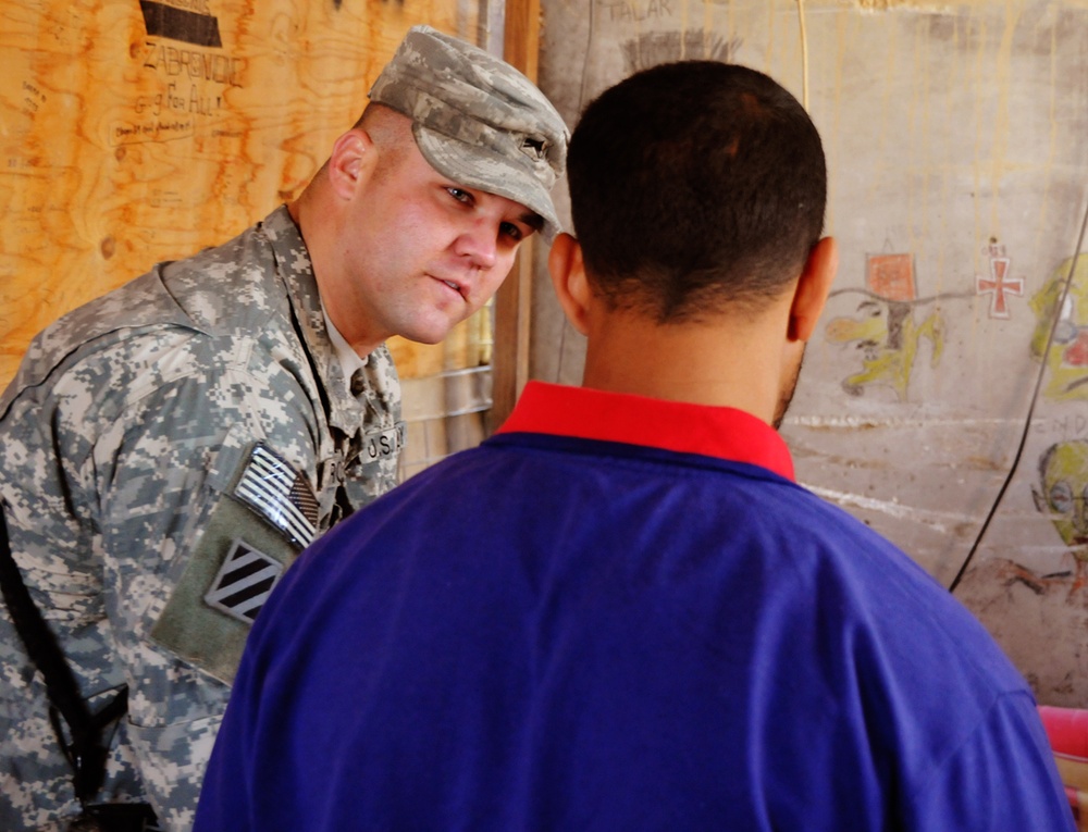 Soldier descends from the fence on Sept. 11