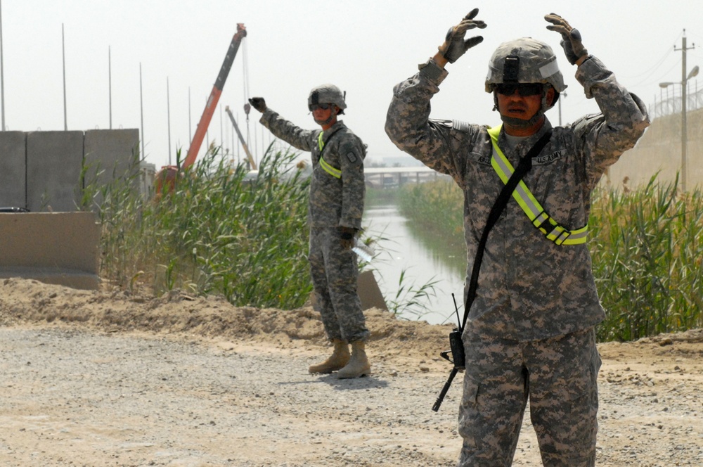 DVIDS Images 277th Engineers improve Liberty, Victory access road