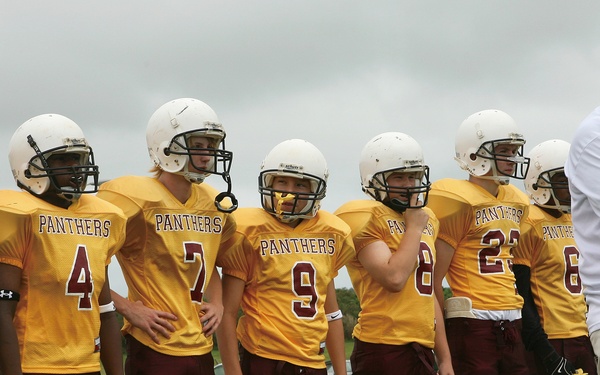Face of Defense: Marine Inspires Youth Through Football