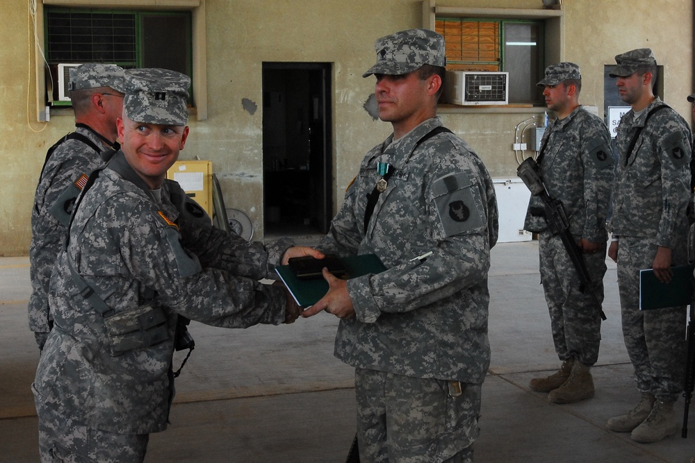 Headquarters and Support Company 834th Aviation Support Battalion Soldier Receives Service Award in Iraq