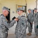 Headquarters and Support Company 834th Aviation Support Battalion Soldier Receives Service Award in Iraq