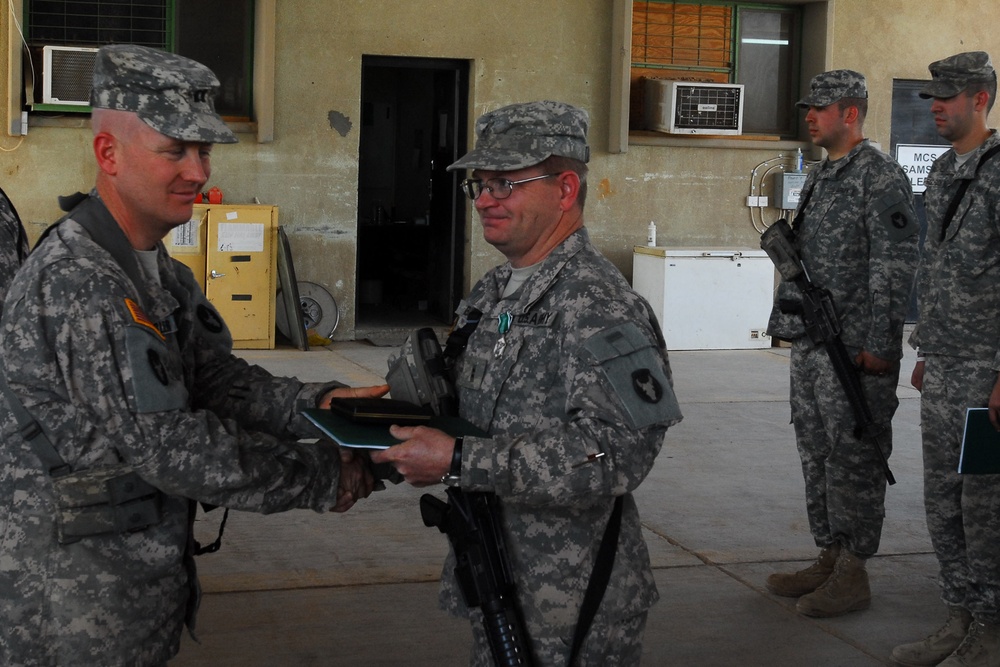 Headquarters and Support Company 834th Aviation Support Battalion Soldier Receives Service Award in Iraq