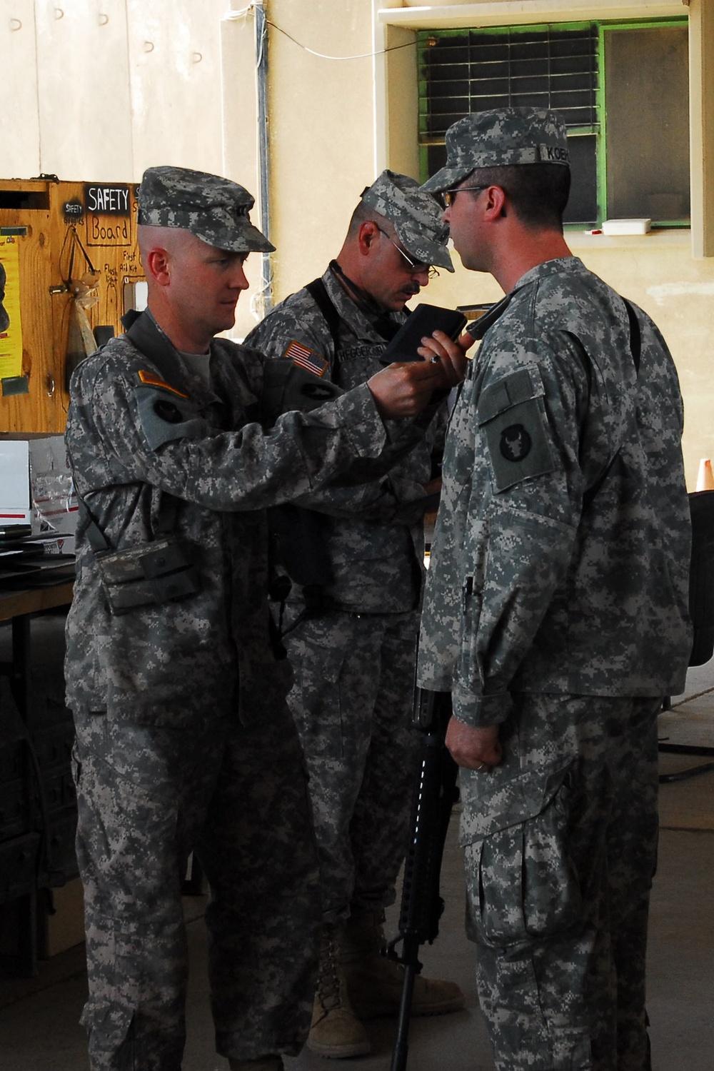 Headquarters and Support Company 834th Aviation Support Battalion Soldier Receives Service Award in Iraq