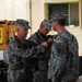 Headquarters and Support Company 834th Aviation Support Battalion Soldier Receives Service Award in Iraq