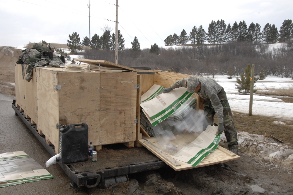 North Dakota National Guard Soldiers help with flooding in Burlington