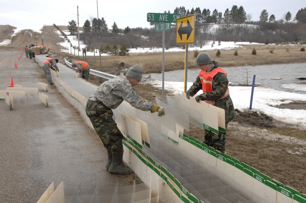 North Dakota National Guard Soldiers help with flooding in Burlington