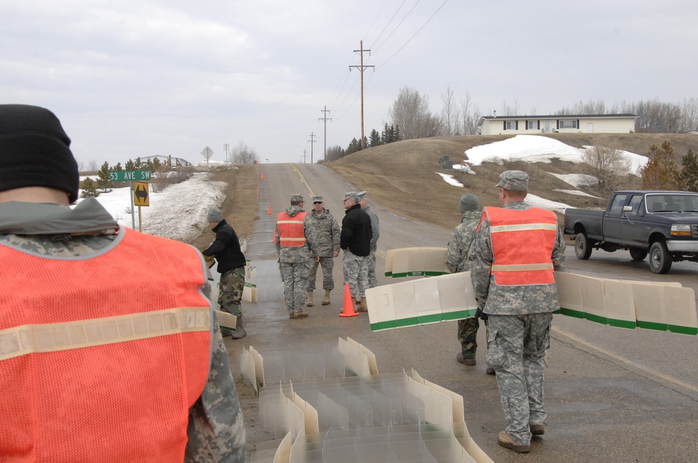 North Dakota National Guard Soldiers help with flooding in Burlington