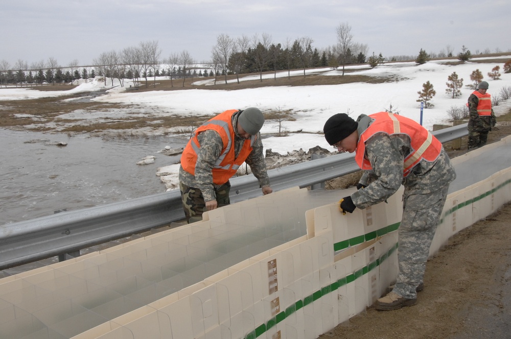 North Dakota National Guard Soldiers help with flooding in Burlington