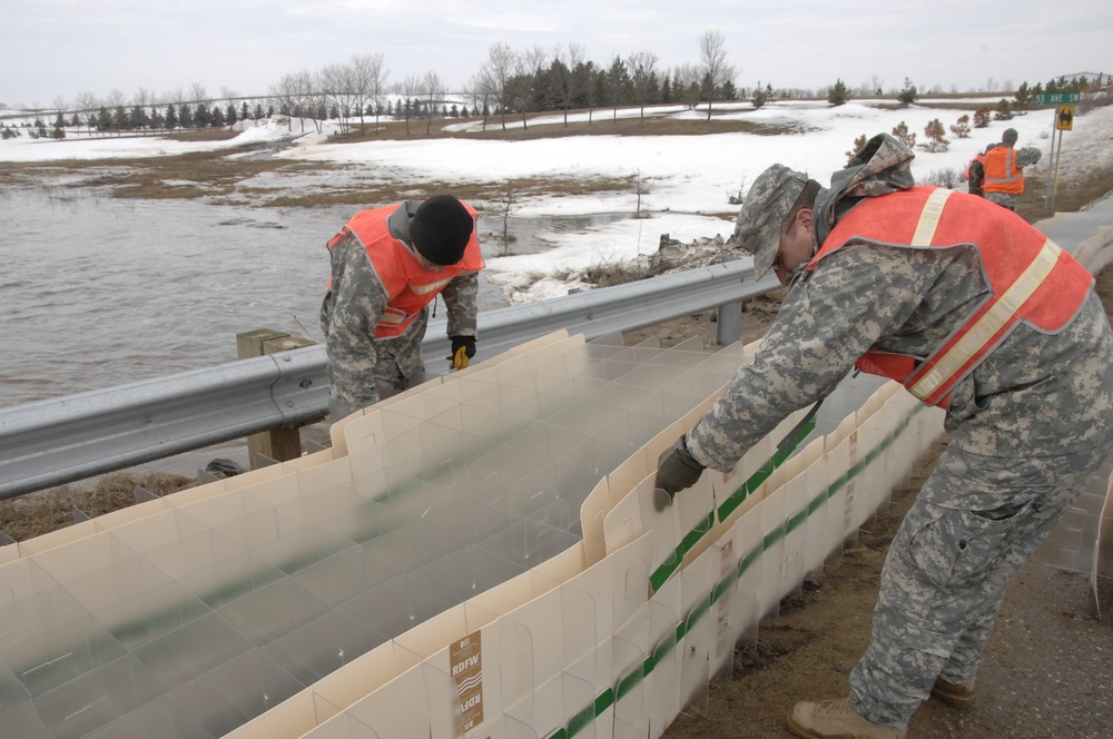 North Dakota National Guard Soldiers help with flooding in Burlington