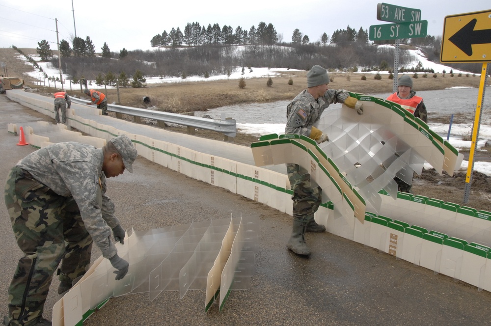 North Dakota National Guard Soldiers help with flooding in Burlington