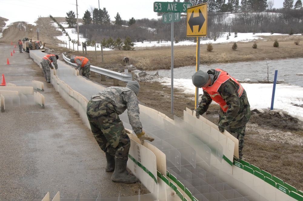 North Dakota National Guard Soldiers help with flooding in Burlington