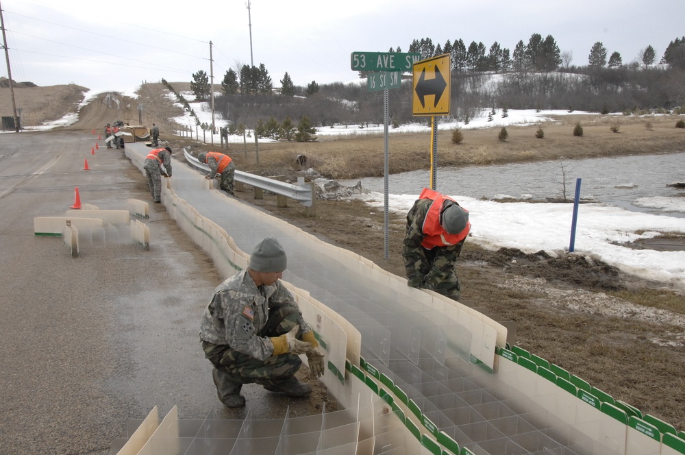 North Dakota National Guard Soldiers help with flooding in Burlington