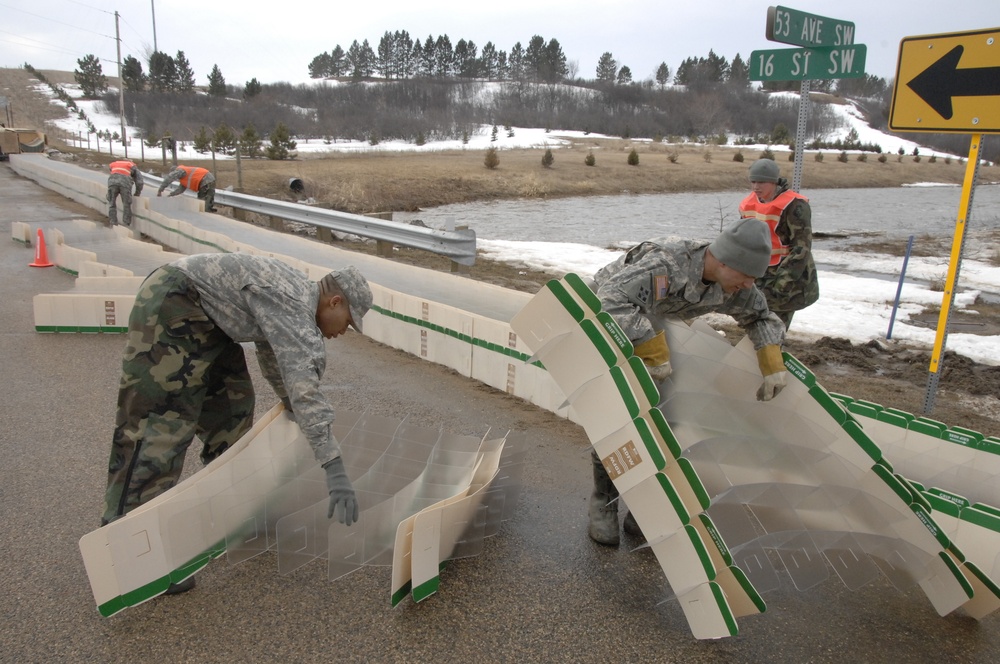 North Dakota National Guard Soldiers help with flooding in Burlington