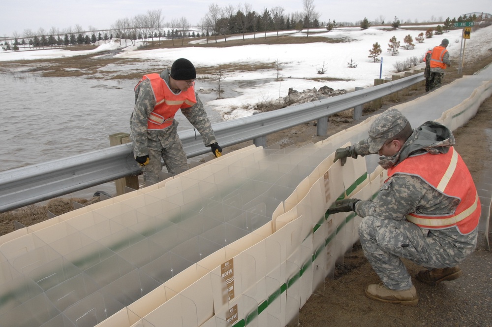 North Dakota National Guard Soldiers help with flooding in Burlington