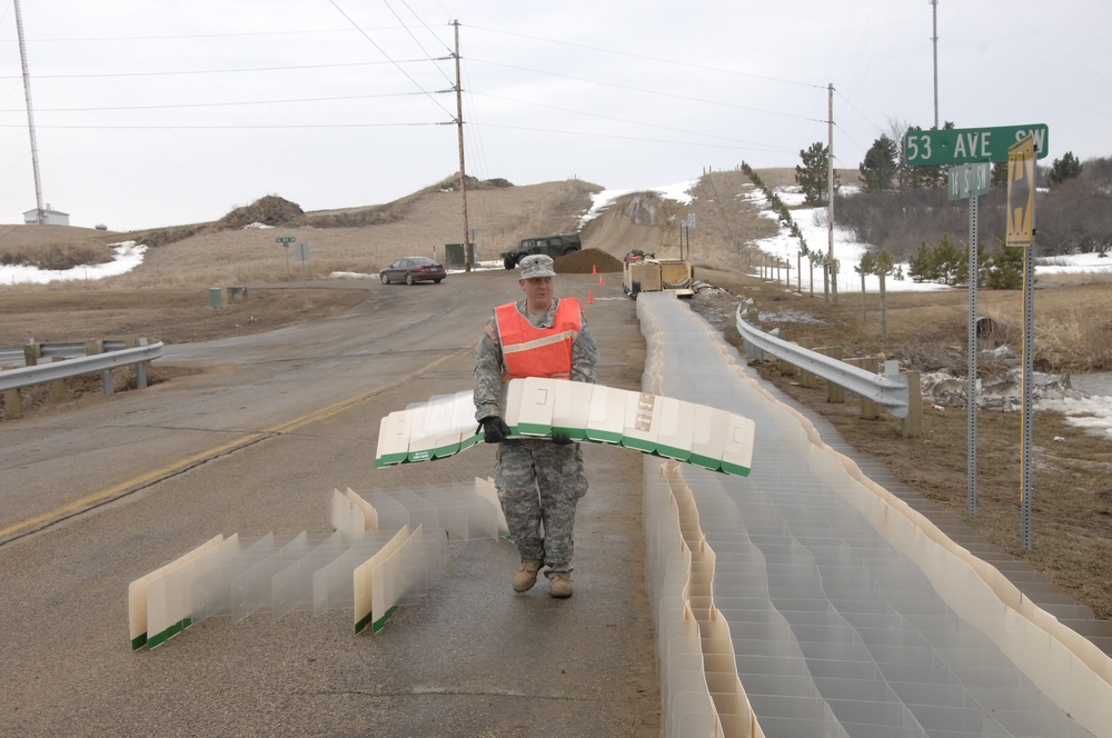 North Dakota National Guard Soldiers help with flooding in Burlington