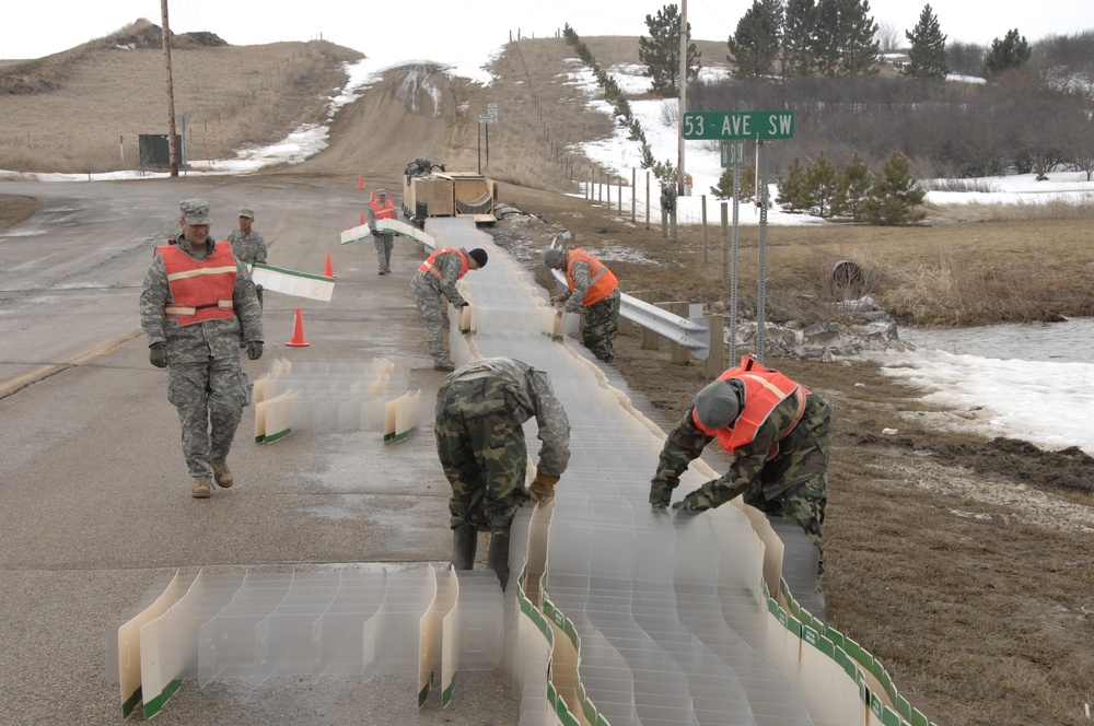 North Dakota National Guard Soldiers help with flooding in Burlington