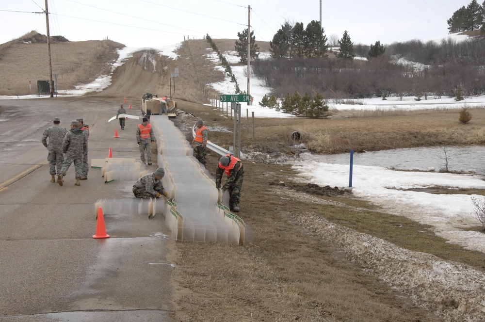 North Dakota National Guard Soldiers help with flooding in Burlington