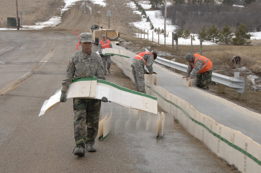 North Dakota National Guard Soldiers help with flooding in Burlington