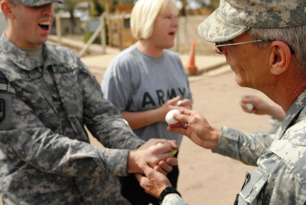 Louisiana Soldiers 'pock' eggs in Baghdad for Easter