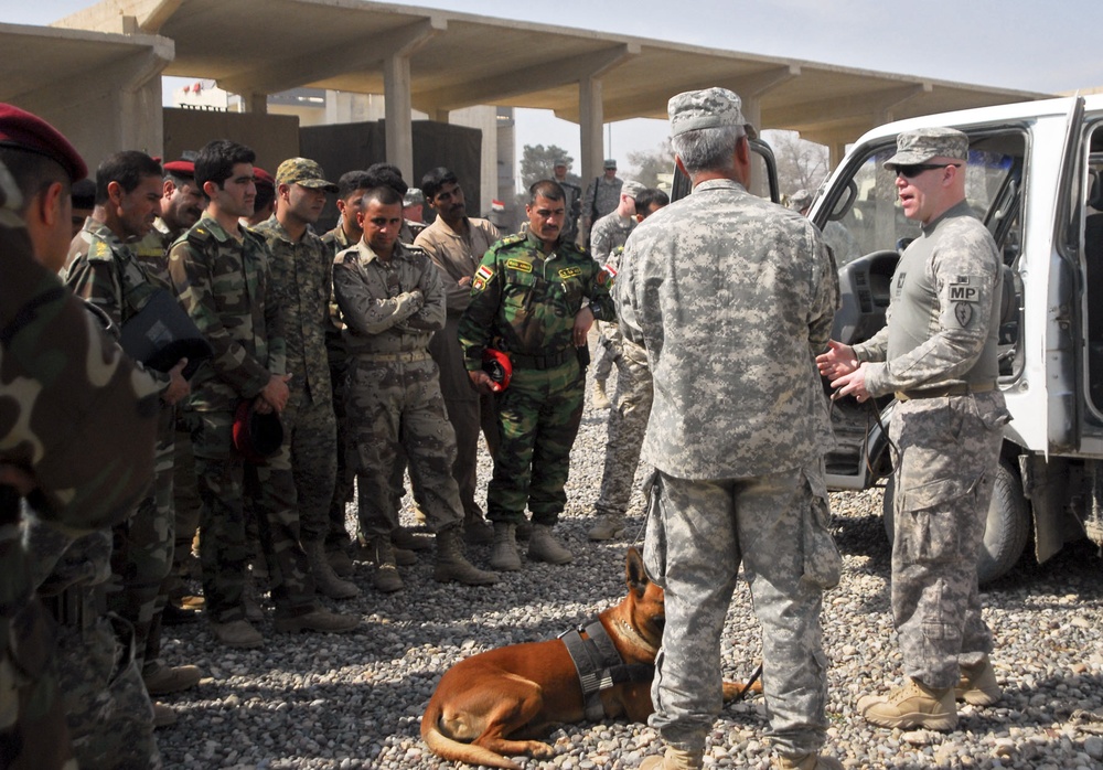 Man's Best Friend Wags Tail to Security in Mosul
