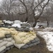 North Dakota National Guard Soldiers sandbag the Schmidt house