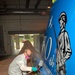 Wisconsin Air Guard Craftsman Applies Anniversary Tail Art to F-16