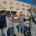 North Dakota adjutant general Maj. Gen. David Sprynczynatyk, right, and North Dakota Governor John Hoeven, second from right, discuss Sheyenne River flood fight and voluntary evacuation of residents of the Lisbon Veteran's Home with facility administrator