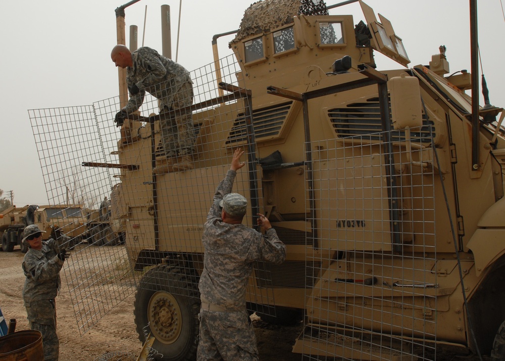 Welding together a defense: Soldiers install low-cost add-ons to vehicles