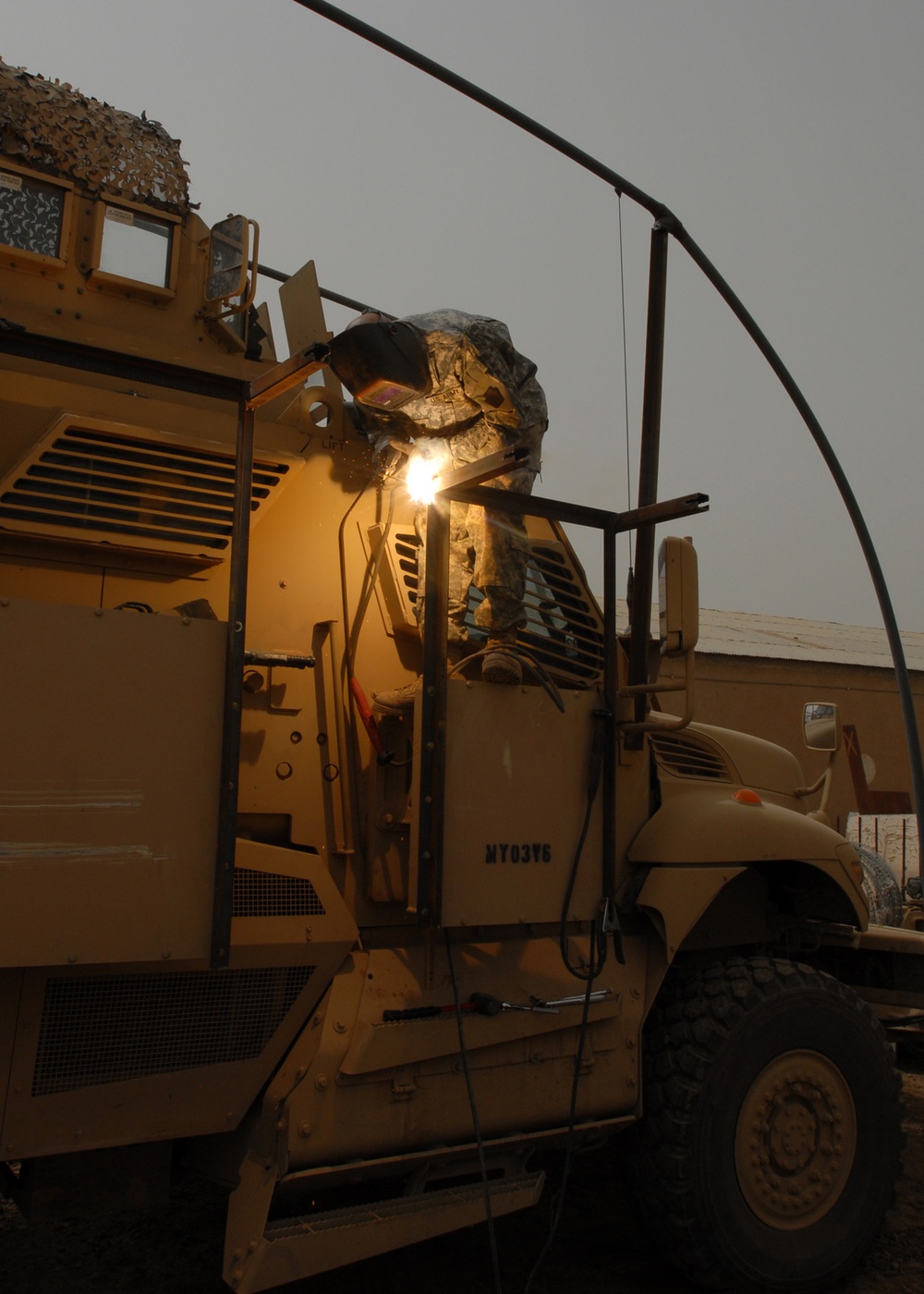 Welding together a defense: Soldiers install low-cost add-ons to vehicles