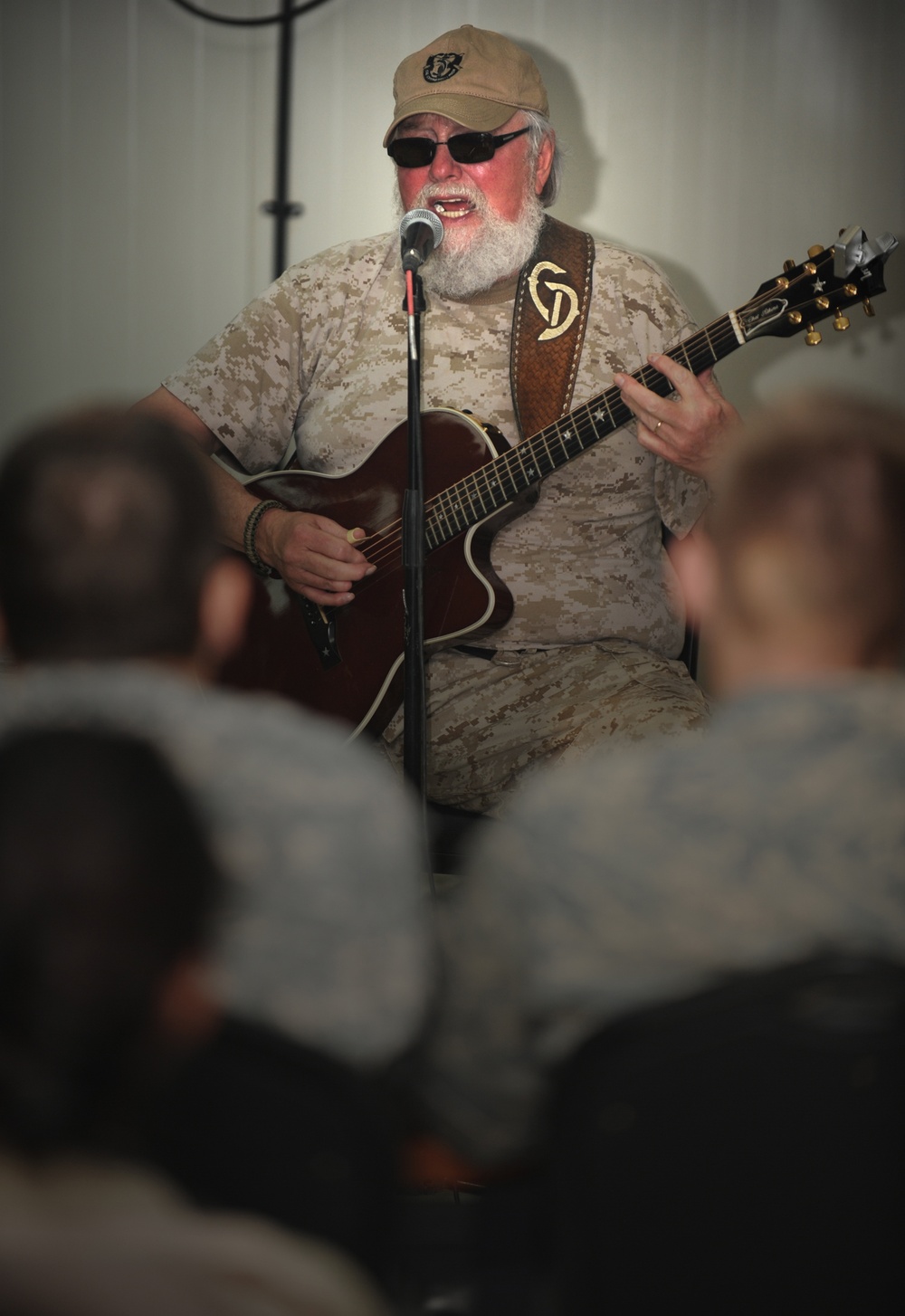 Charlie Daniels performs for Joint Base Balad service members, autographs guitars