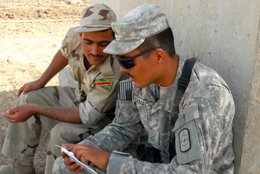 277th Engineers tutor Iraqi Army in heavy equipment project