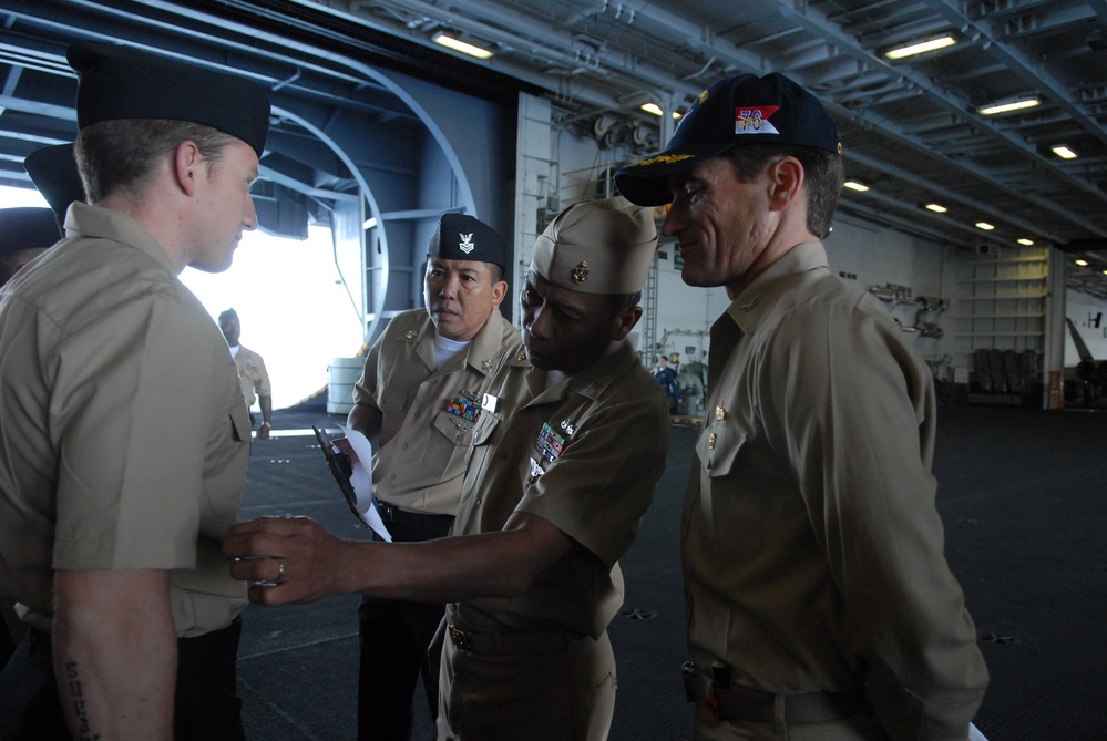 Uniform check aboard the USS Ronald Reagan