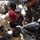 Picking up trash in Al Hayy, Iraq