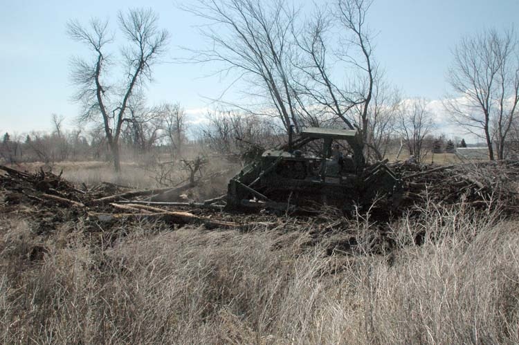 Guard Units Converge on Neche, Border Town Remains the Focus of Flood Fight in Northeastern North Dakota