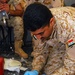Iraqi police graduate medic training at Forward Operating Base Delta