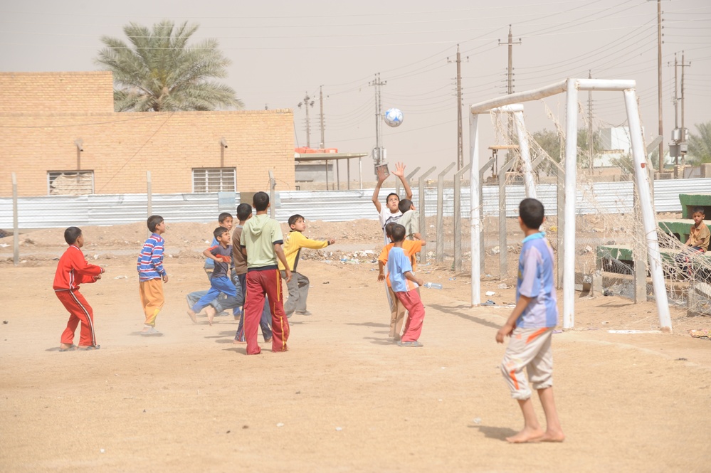 Assessing soccer fields in Baghdad