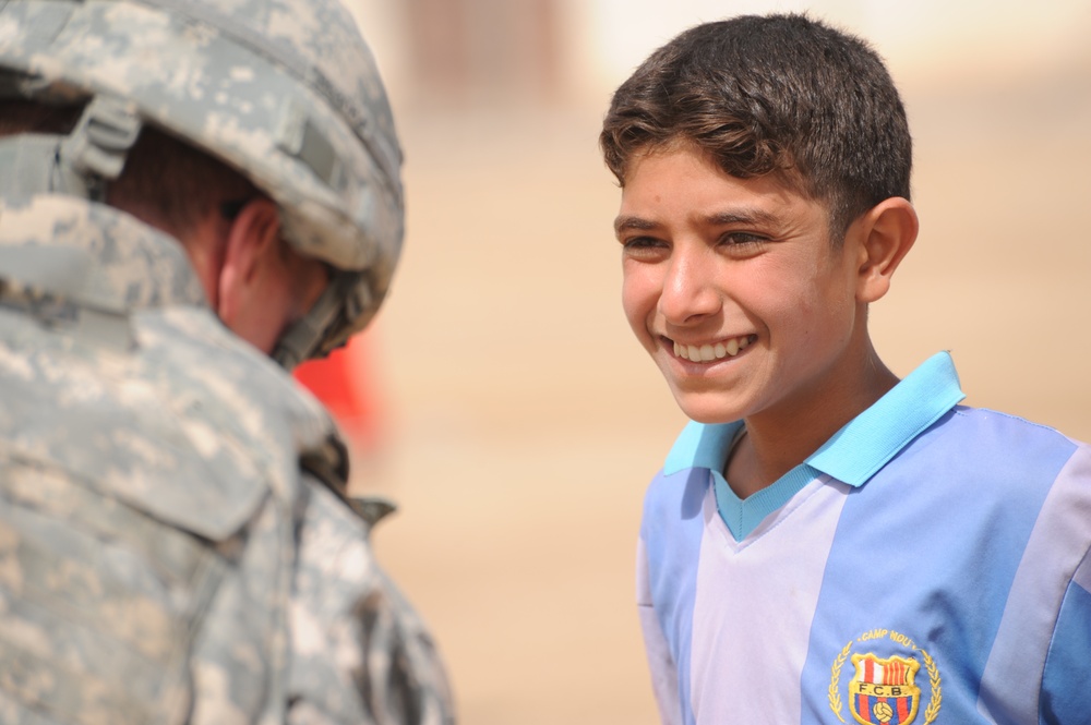 Assessing soccer fields in Baghdad