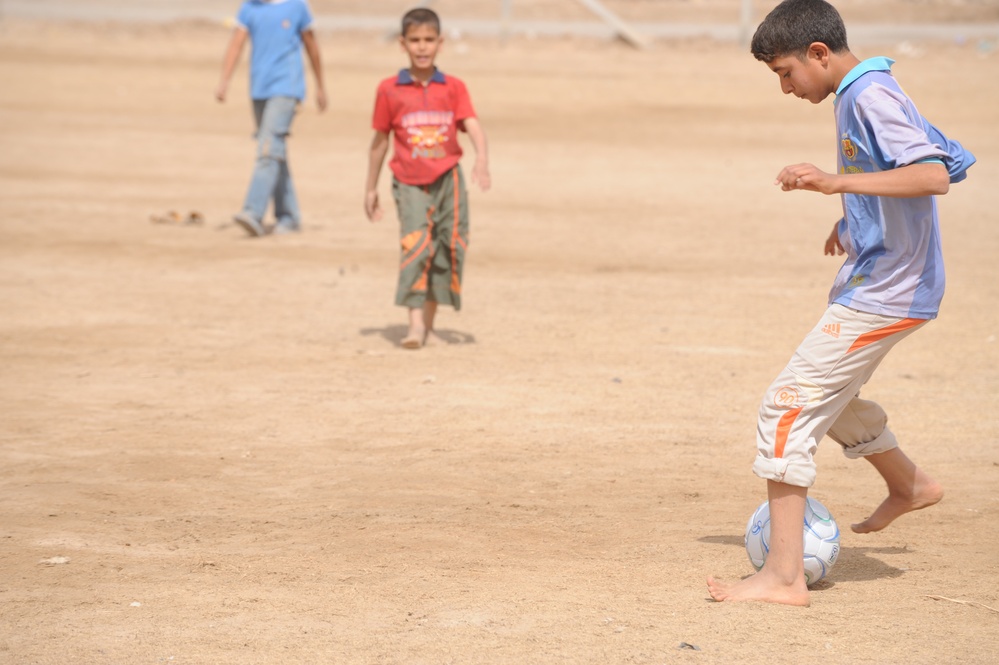 Assessing soccer fields in Baghdad