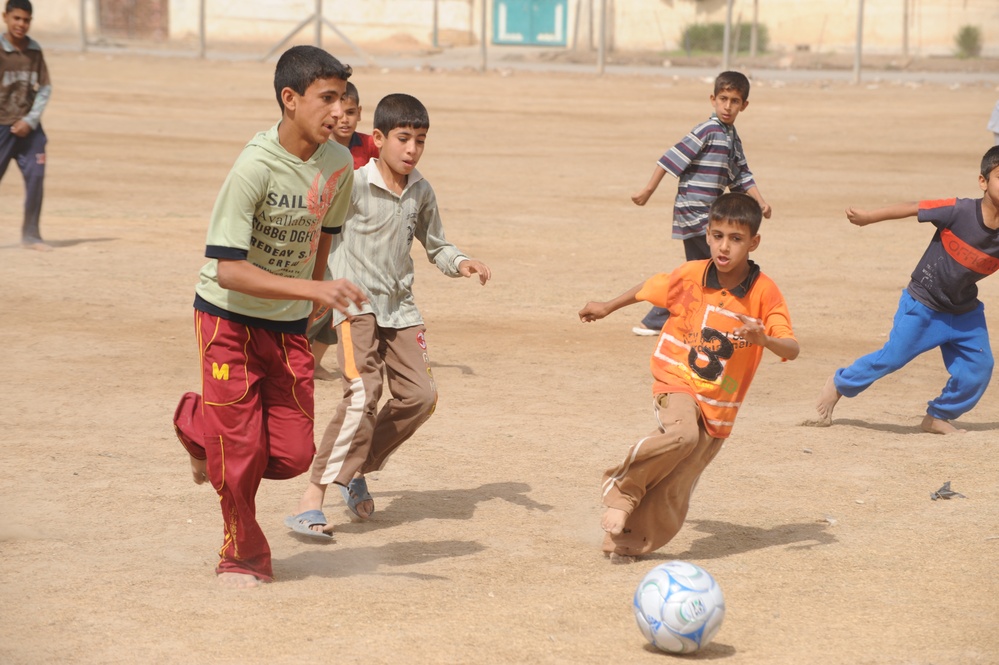 Assessing soccer fields in Baghdad